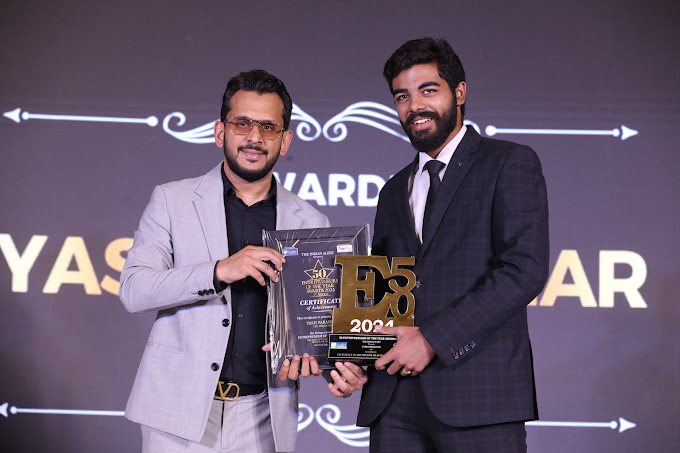 ReachCure CEO Yash Parashar receiving award